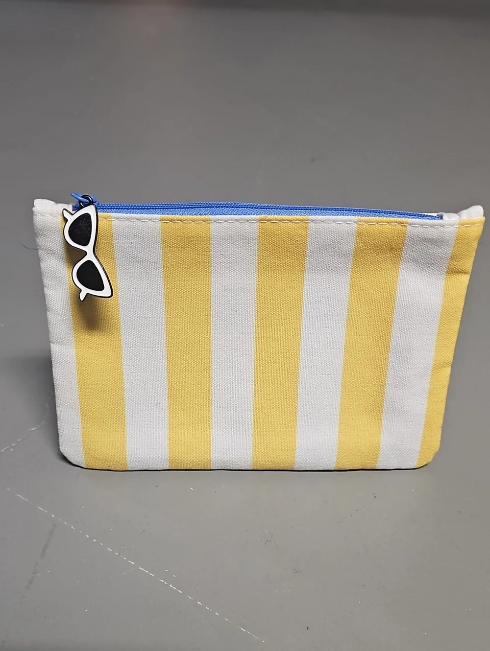 IPSY Glam Bag July 2026 Yellow & White Stripes Beach Theme
